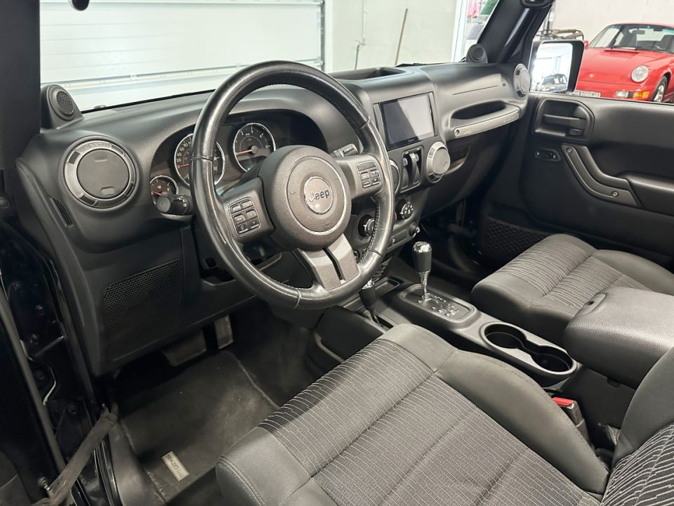 Jeep Wrangler 2.8 CRD 200ch Sport BVA6, l'aventure sur tous les terrains - image 1